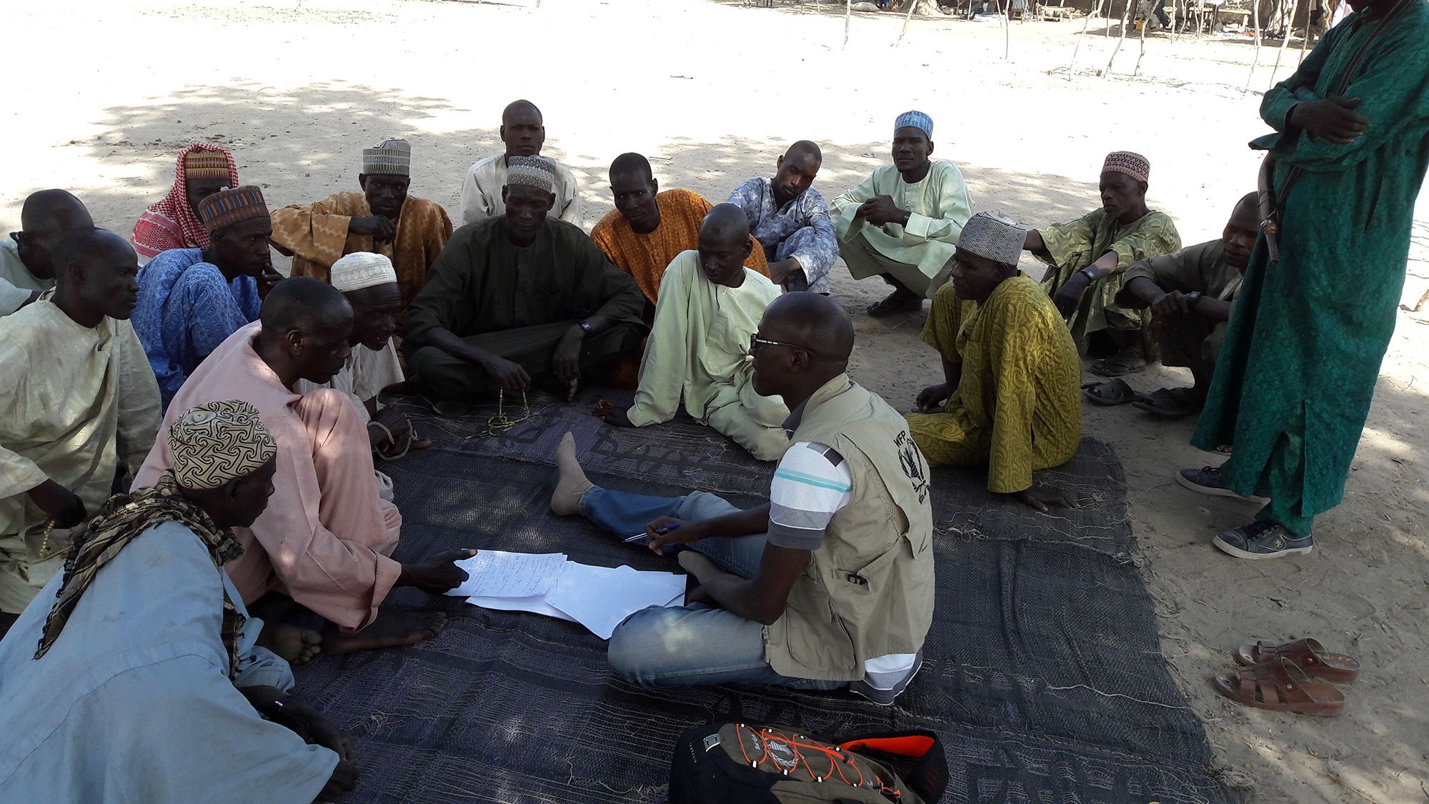 WFP's Moutapha Toure conducts Vulnerability Analysis and Mapping interviews in a village near Maiduguri, Nigeria